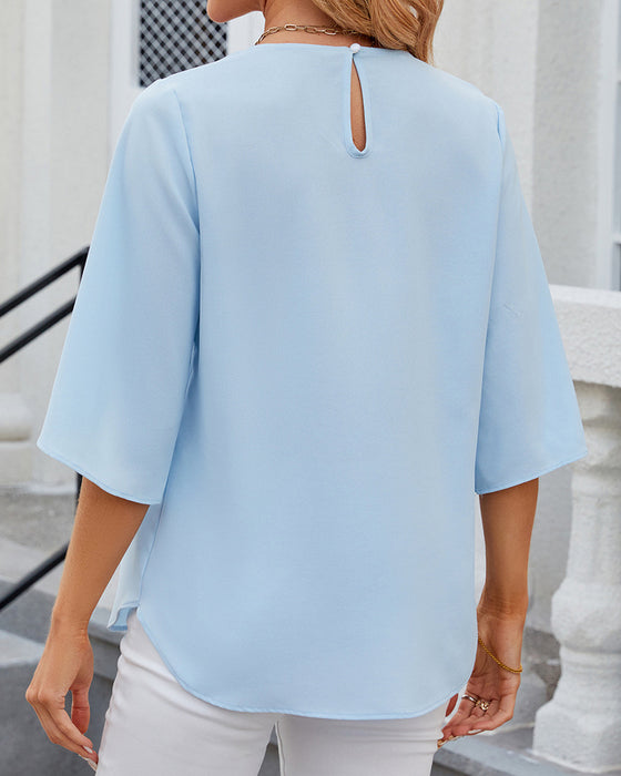 Elegante Bluse in einfarbiger Optik mit halben Ärmeln