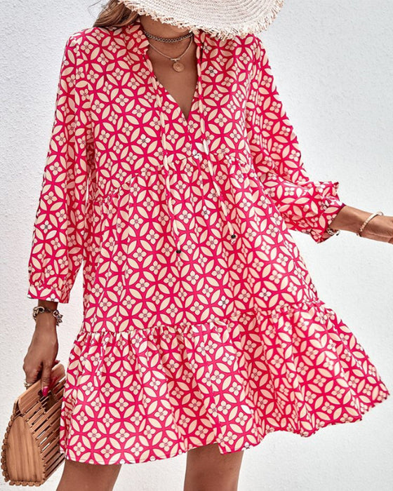Kleid mit V-Ausschnitt und langen Ärmeln