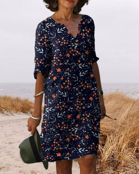 Kleid mit V-Ausschnitt und Halbarm
