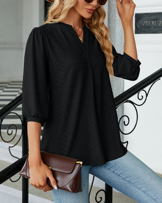 Einfarbige Jacquard-Bluse mit V-Ausschnitt