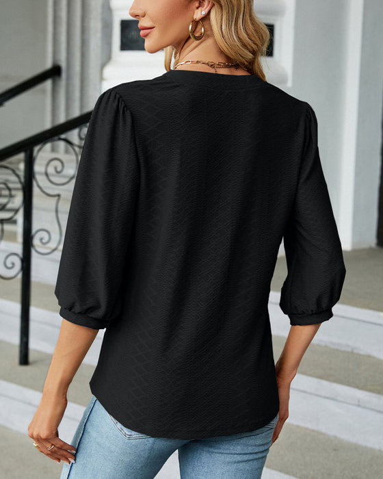 Einfarbige Jacquard-Bluse mit V-Ausschnitt