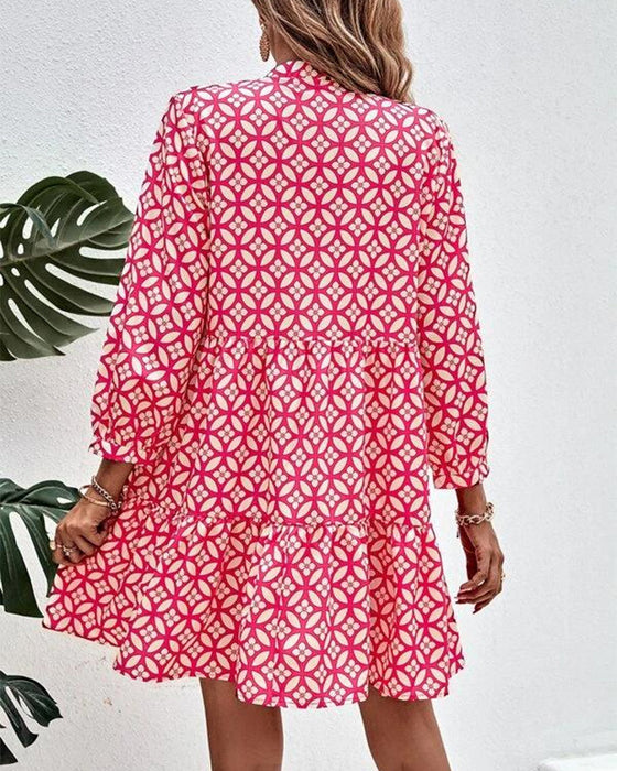 Kleid mit V-Ausschnitt und langen Ärmeln