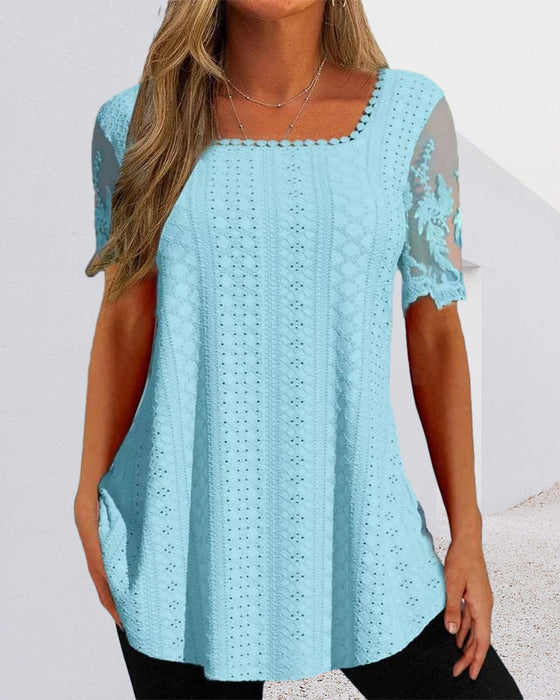 Bluse mit hohlen Stickereien und kurzen Ärmeln