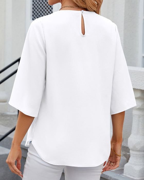 Elegante Bluse in einfarbiger Optik mit halben Ärmeln