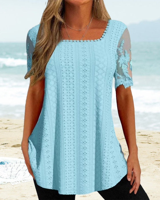 Bluse mit hohlen Stickereien und kurzen Ärmeln