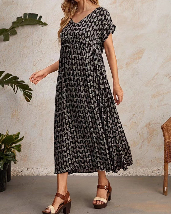 Langes Kleid mit V-Ausschnitt und kurzen Ärmeln