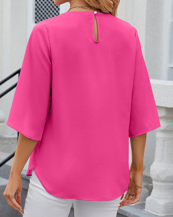 Elegante Bluse in einfarbiger Optik mit halben Ärmeln